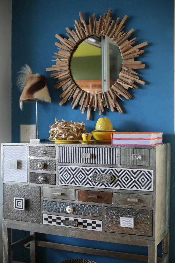 storage-wood-mirror-blue-wall